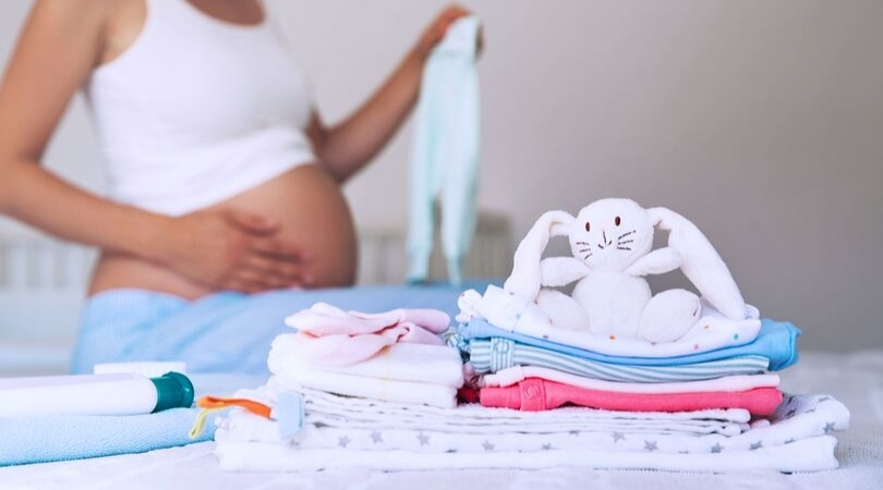 prep home for baby - baby clothes 